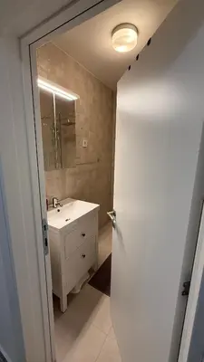 a bathroom with a sink and a mirror at GardosHouse Apt 2 in Belgrade