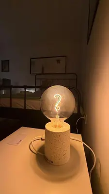 a lamp sitting on top of a table in a room at GardosHouse Apt 3 in Belgrade