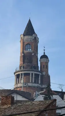 a building with a tower on top of a roof at GardosHouse Apt 4 in Belgrade