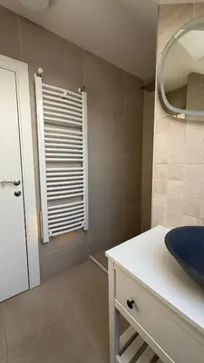 a bathroom with a sink and a mirror at GardosHouse Apt 4 in Belgrade