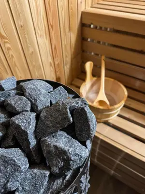 a basket of rocks sitting next to a bowl at KosMy dream in Sopot