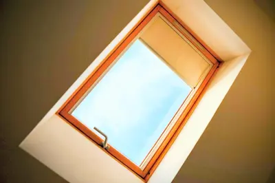 a window in the ceiling of a room at Old Port Riverside Lofts in City Center in Belgrade