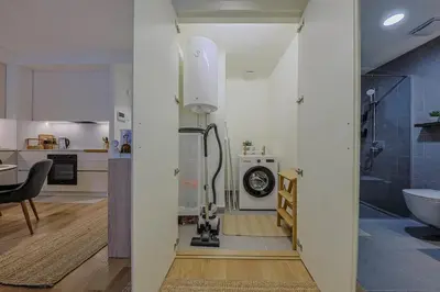a room with a kitchen and a bathroom with a sink at S310 with free parking in Belgrade