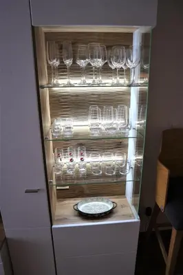 a refrigerator with wine glasses and a plate in it at Romantic One Bedroom Home at BW-City and Park View in Belgrade