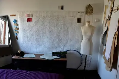 a mannequin standing next to a bed with a mannequinrencesomaly at casa CIUK in Belgrade