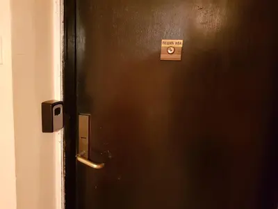 a black door with a sign on it at casa CIUK in Belgrade