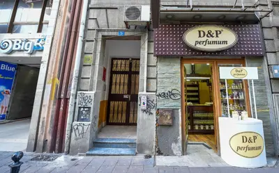 a store front of a building with graffiti on it at Apartment Vukanja in Belgrade
