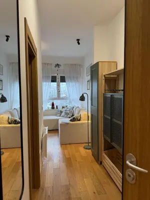 a room with a living room with a couch at DUMA Apartmani Arandjelovac in Arandjelovac