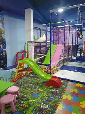 a play room with a slide and a playground at Cute 3-bedroom apartment at nice place in Pančevo in Pančevo