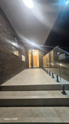 a hallway of a building with a row of doors at Zemun Golax Apartments in Belgrade
