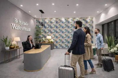 a group of people standing in a lobby with luggage at Modern Premium Studio - Belgrade Waterfront - Verde in Belgrade