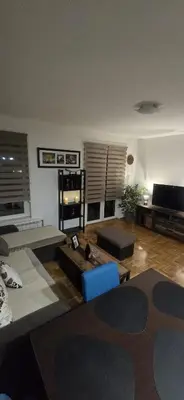 a living room with a couch and a table at City Stay Apartments in Belgrade