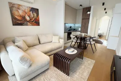 a living room with a couch and a table at Colorway Prime,Stari grad in Belgrade