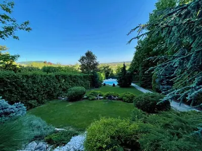 a garden with a pond in the middle at Luxury Private Villa Estate Families & Groups Pool & Beach BBQ Garden & Yard Free Parking Near Center #Belgrade Villa in Belgrade