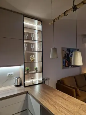 a kitchen with a counter with two potted plants at W65 ElegantStay II in Belgrade