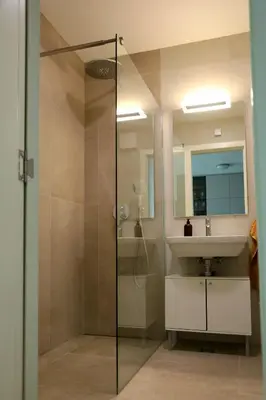 a bathroom with a shower and a sink at W65 ElegantStay II in Belgrade