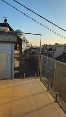 a balcony with a view of a city at Temple Sky View Apartment Vracar in Belgrade