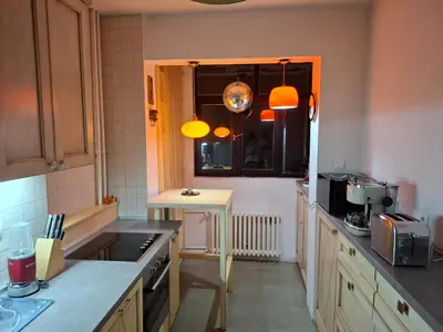 a kitchen with a sink and a counter top at Spacious apartment with 2 bedrooms in City Center, near Parliament and St Marks Church in Belgrade