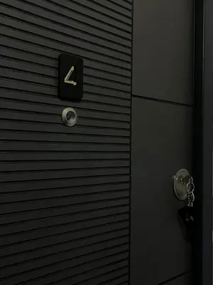a sign with the number four on a wall at Crassula Lux 4 in Surčin