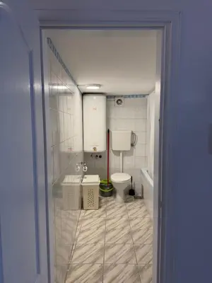 a bathroom with a toilet and a sink at Apartman Tara in Belgrade
