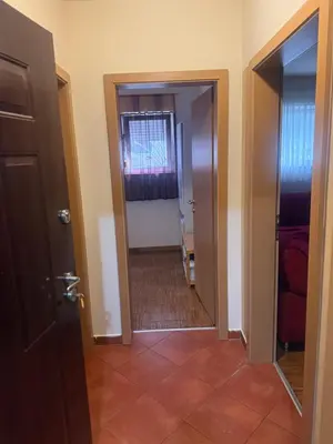 a hallway with a door leading into a room at City Center Apartment Cvijiceva in Belgrade