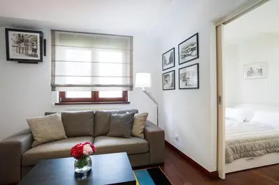 a living room with a couch and a bed at Apartment 18 in Belgrade