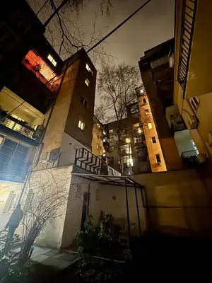 a view of a building in a city at night at Cozy City Center Nest - Quiet Courtyard Patio in Belgrade