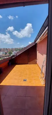 a balcony with a view of a tennis court at Michigan Hill Apartmant in Belgrade