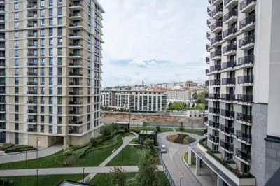 a view of a street between two tall buildings at Velora BW Metropolitan in Belgrade