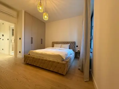 a bedroom with a bed in a room at BW Home in Belgrade