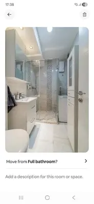 a bathroom with a shower and a sink and a toilet at COZY Urban Heaven in Belgrade