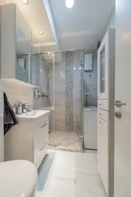 a bathroom with a shower and a toilet and a sink at COZY Urban Heaven in Belgrade