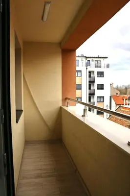 an empty balcony with a view of a building at Dok city apartman in Belgrade