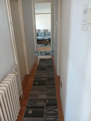 a hallway with a view of a living room at Bezanija86 in Belgrade
