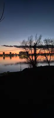 a view of a body of water at sunset at Danube Retreat in Belgrade
