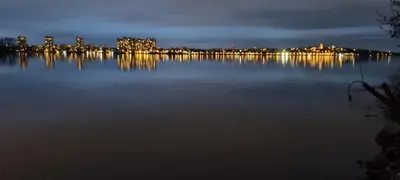 a view of a large body of water at night at Danube Retreat in Belgrade