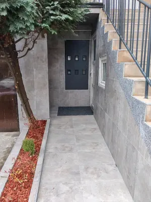 a walkway leading up to the door of a building at Jacuzzi Sauna - Besplatan parking in Belgrade