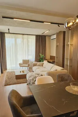 a large living room with couches and a table at BW Exclusive apartment in Belgrade