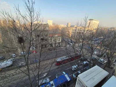 a view of a city with buses and parked cars at Apartment Madera in Belgrade
