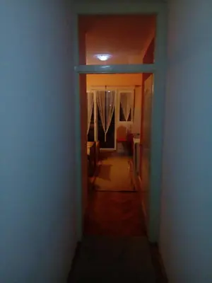 a hallway leading to a room with a bedroom at Guest house Mirijevski Konak in Belgrade
