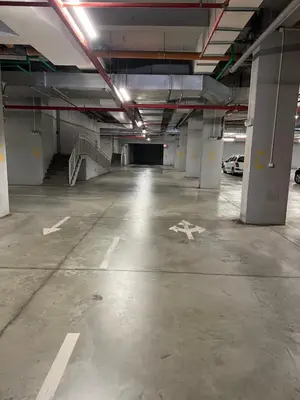 an empty parking lot in a parking garage at Pleasure Lux1 Apartment in Belgrade