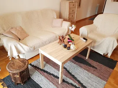 a living room with a coffee table and a couch at Shining in Belgrade