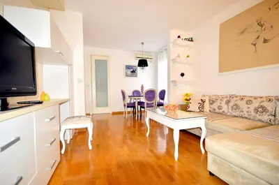 a living room with a couch and a table at Clean&Cozy Apartments Novi Beograd in Belgrade