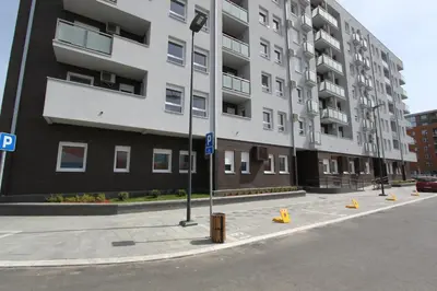 a large apartment building on a city street at Riviera New Belgrade apartment, parking 5 eur per day in Belgrade