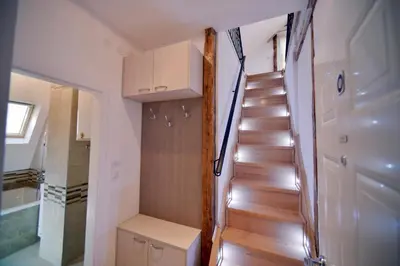 a staircase in a tiny house with a room at Fd.Eight Apartment in Belgrade