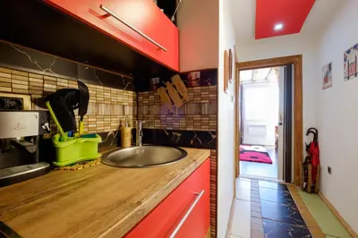 a kitchen with a sink and a counter at Apartment 14 in Belgrade