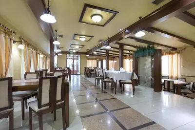 a dining room with a table and chairs at Sabor in Belgrade