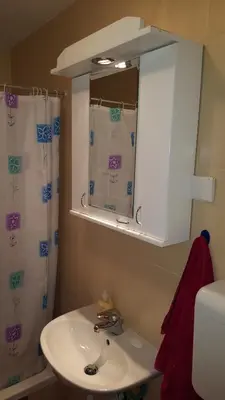 a bathroom with a sink and a mirror at Apartment Greenfield in Belgrade