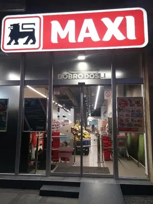 a store with a max sign on the front of it at Top Belgrade Apartments in Belgrade