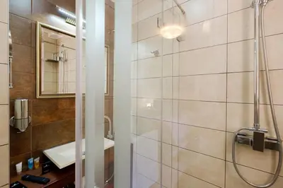 a bathroom with a shower and a sink at Enjoy Belgrade in Belgrade